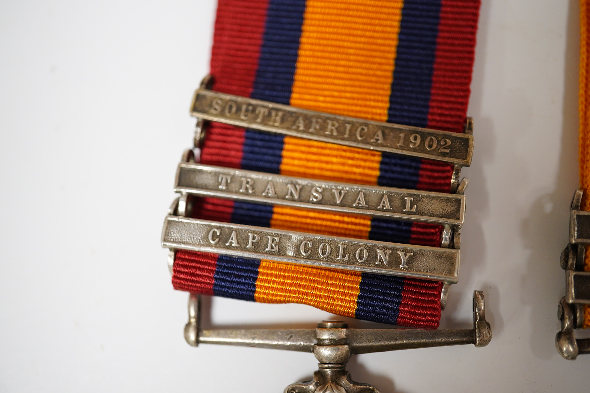 A Queen's South Africa & King's South Africa group of two with SA 1902, Traans and CC/ SA1901 and 1902 clasps to 5519 Pte E.Comber Middlesex Regt